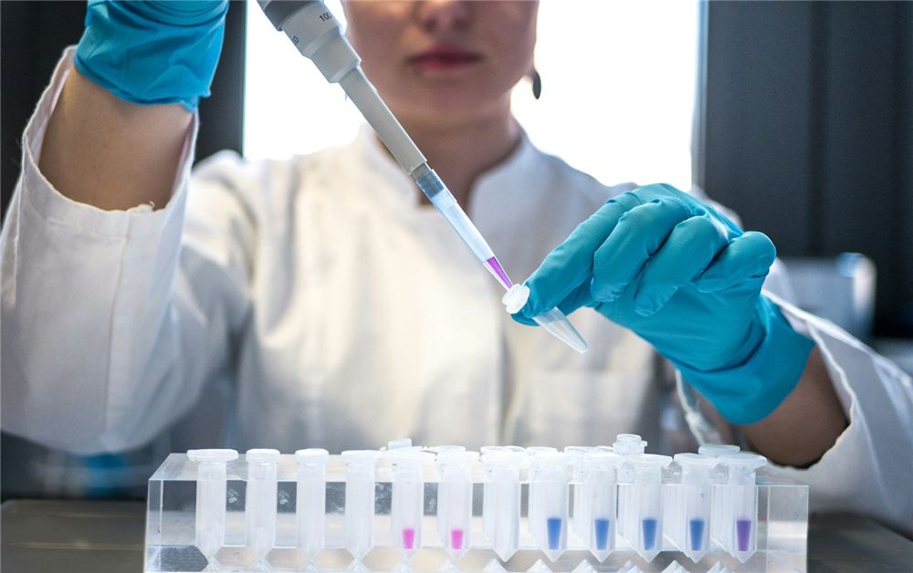 Quality control scientist testing samples in a laboratory